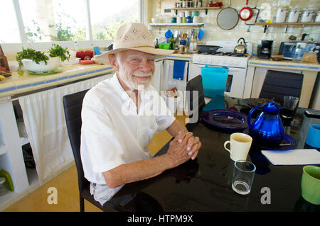 happy elderly man in kitchen Stock Photo