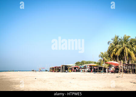 Several stalls with souvenirs and fresh coconuts on Saint Martin's island, Bangladesh Stock Photo