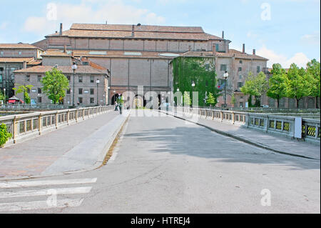 Giuseppe Verdi bridge across the Parma stream leads to the Pilotta Palace, large complex, including Farnese Theatre, National Gallery, Palatina Librar Stock Photo