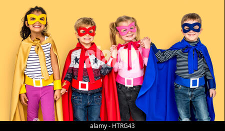 Little Kids Dressing Superhero Hold Hands Stock Photo