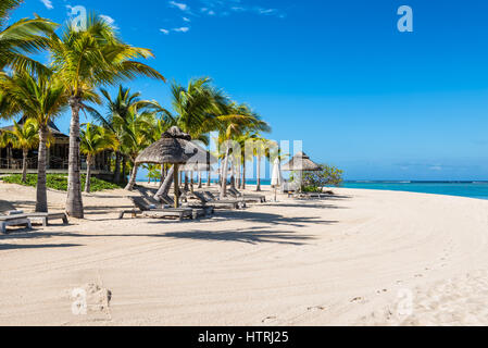 Le Morne, Mauritius - December 11, 2015: Amazing white beaches of Mauritius island. Tropical vacation in Le Morne Beach, Mauritius. Stock Photo