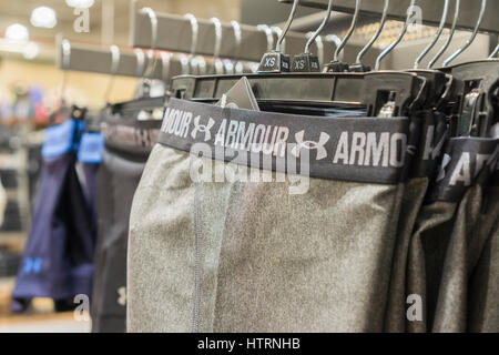 Under Armour brand clothing in new Dick's Sporting Goods store in the Glendale neighborhood of Queens in New York during its grand opening sales on Saturday, March 11, 2017. The new store is in a location formerly occupied by the now closed Sports Authority.  (© Richard B. Levine) Stock Photo