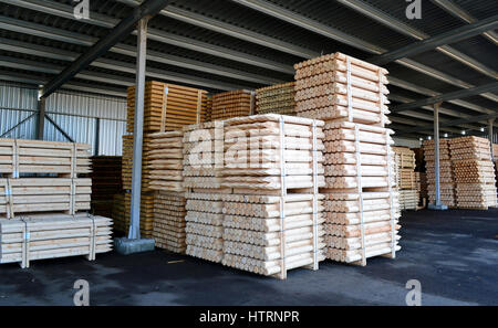 lumber stacked in piles in stock Stock Photo