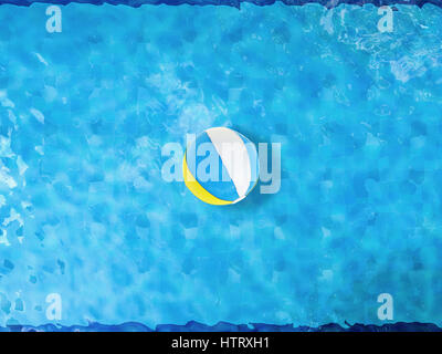 beach balls floating on pool top view Stock Photo