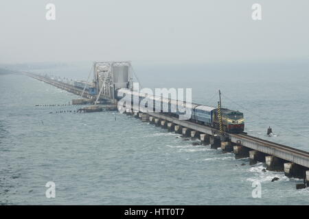 A train on the Pamban Bridge that connects Rameswaram to the Indian Mainland Stock Photo