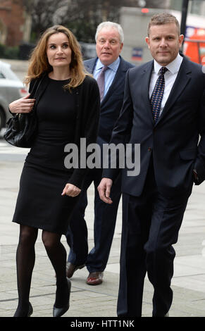 Celebrity chef Gordon Ramsay's father-in-law Chris Hutchenson (back) with daughter Orlanda and son Adam arriving at Westminster Magistrates' Court in London accused of hacking a computer. Stock Photo