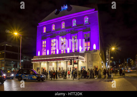 The Old Vic at night with people queuing to see Rosencrantz and Guildenstern are Dead by Tom Stoppard. Stock Photo