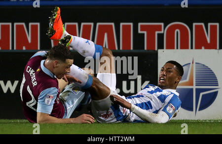 Aston Villa's James Chester and Huddersfield Town's Elias Kachunga collide Stock Photo