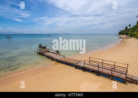 Idilic paradise beach and sea to horion with floating jetty. Stock Photo