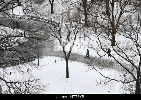 People walking in Dupont Circle in Washington, USA as a storm expected to drop more than a foot of snow has pounded the north-eastern US, paralysing much of the Washington-to-Boston corridor. Stock Photo