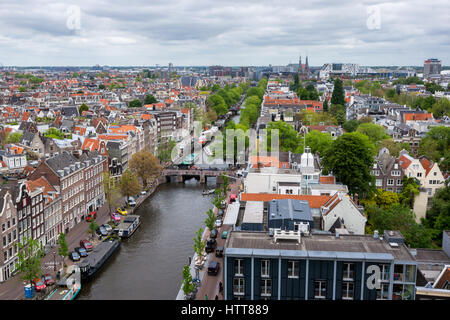 Amsterdam city, The Netherlands, from above with tree lined canal, boats and unique buildings Stock Photo