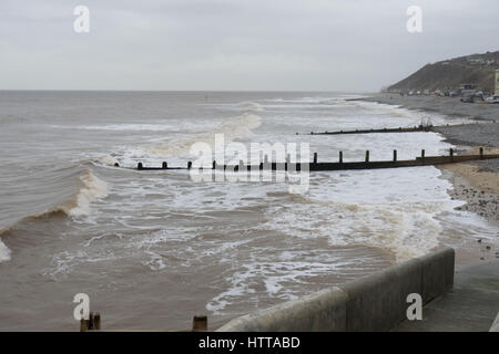 Groynes and other sea defenses in Cromer, Norfolk, UK. Stock Photo