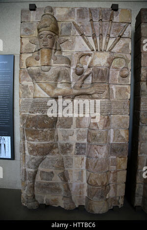 Elam. Moulded clay brick panel: God (bull-man) with palm-trees (symbols of fertiliy. Temple of Inshushinak, Susa, 2000 BCE. Louvre. Paris. Stock Photo