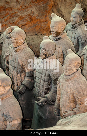 More than eight thousand full-size clay figures of warriors, horses and chariots were buried near the mausoleum of Emperor Qin Shi Huang in Xi'an. Stock Photo