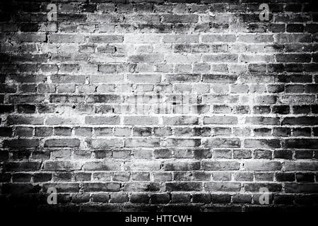 Old brick wall background. Grunge texture. Black wallpaper. Dark surface Stock Photo