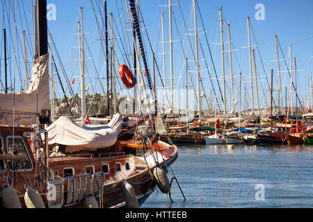 View of many yachts (sailboats) parked at Bodrum marina. It is a sunny summer day. Stock Photo