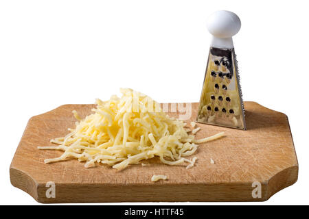 Grated cheese mix on wooden cutting board with one little grater isolated over white background with clipping path Stock Photo