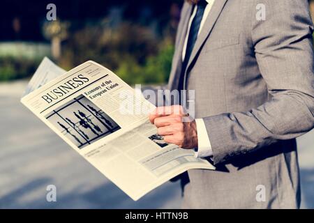 Businessmen Read Hands Hold Newspaper Stock Photo