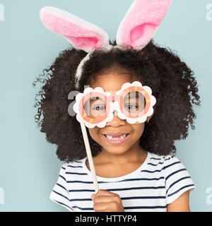 African Descent Little Girl Bunny Ears Concept Stock Photo