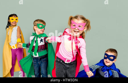 Little Kids Dressing Superhero Hold Hands Stock Photo