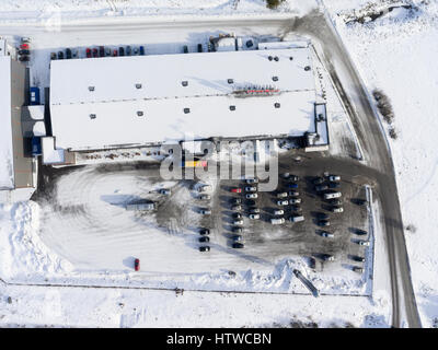NUIJAMMAA, FINLAND - CIRCA FEB, 2017: Top view at Laplandia market warehouse and parking lot. Finland’s cheapest store is located on Russian-Finnish b Stock Photo