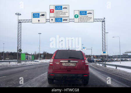 NUIJAMAA, FINLAND - CIRCA FEB, 2017: Red and green corridors are on of Finnish–Russian borderline checkpoint. Nuijamaa is the busiest border crossing  Stock Photo