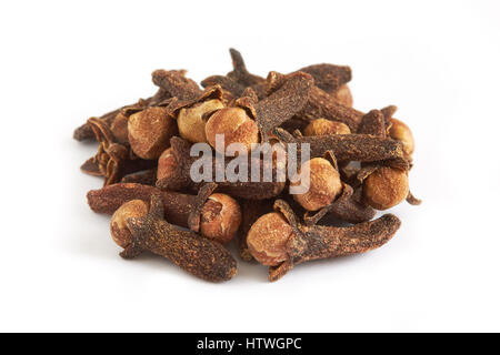 Pile of cloves isolated on white background, selective focus Stock Photo
