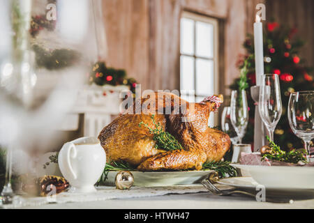 Delicious roasted turkey on served holiday table Stock Photo