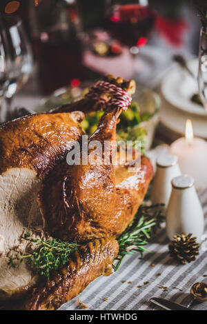 Delicious roasted turkey on served for Christmas table Stock Photo