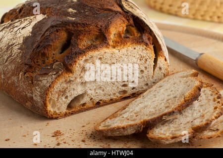 Traditional fresh german Krustenbrot and slices Stock Photo