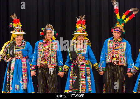 ARLINGTON, VIRGINIA, USA - Bolivian folk dancing group performs the Tinku dance during competition. Arlington has a large Bolivia immigrant community. Stock Photo