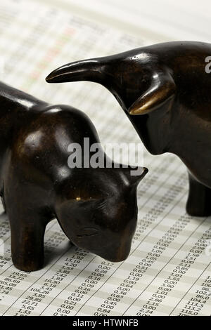 bull and bear at newspaper with stock quotes Stock Photo