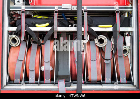 fire hoses with Storz couplings on board a fire engine Stock Photo