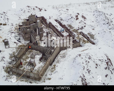 Foundation of a house being built in the middle of winter Stock Photo