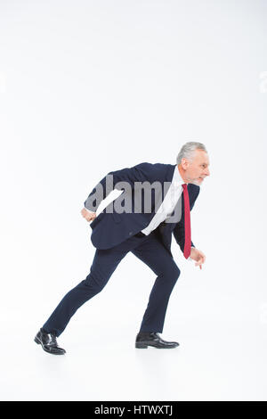 Businessman ready to run Stock Photo