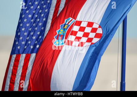 Croatian and American national flags waving. Stock Photo