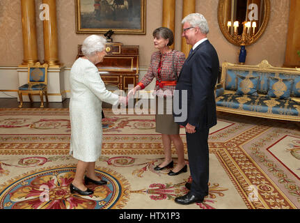 Queen Elizabeth II with His Excellency the Honourable Paul de Jersey, Governor of Queensland, during a private audience at Buckingham Palace, London. Stock Photo