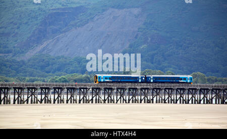 Barmouth Bridge provides a crossing over the Mawddach Estuary for the Cambrian Coast Rail line, Barmouth, Gwynedd, Wales, Europe Stock Photo