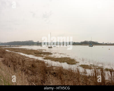 Along the grassy waterfront of Wivenhoe down into Alresford. Stock Photo