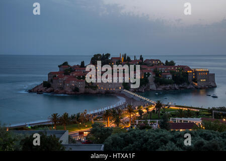 Sveti Stefan is a small islet and 5-star hotel resort on the Adriatic coast of Montenegro, approximately 6 kilometres southeast of Budva Stock Photo