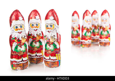 Closeup of Santa Claus chocolate figurine .Isolated on a white background Stock Photo