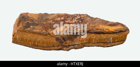 Raw Tiger's Eye gemstone isolated on white background Stock Photo