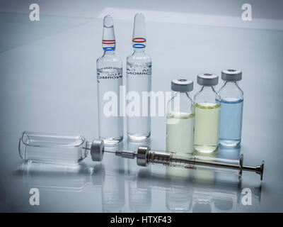 Medicine in vials and syringe ready for vaccine injection Stock Photo