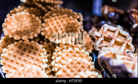 Macro closeup of waffle cookies on display in bakery Stock Photo
