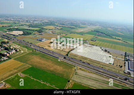 Aerial view, of new shopping center,  mall, condominium construction close to Parma, Emilia Romagna, Italiy, highway, A1 Stock Photo