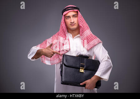 Arab businessman on gray background Stock Photo