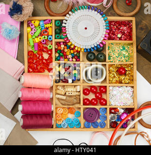 set of accessories and jewelry to embroidery, sewing accessories top view, seamstress workplace, many object for needlework, embroidery, handmade and  Stock Photo