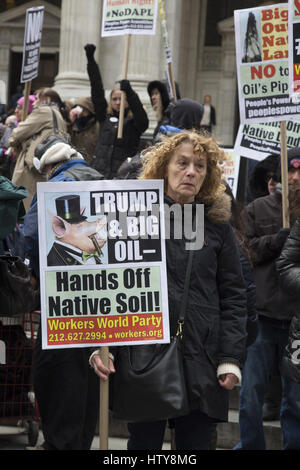 Rally & March in solidarity with  Native American opposition to Dakota Access Pipeline and other Trump Administration attacks on the environment,  especially those affecting water quality. 5th Avenue, New York City. Stock Photo