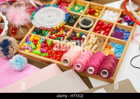 set of accessories and jewelry to embroidery, sewing accessories top view, seamstress workplace, many object for needlework, embroidery, handmade and  Stock Photo