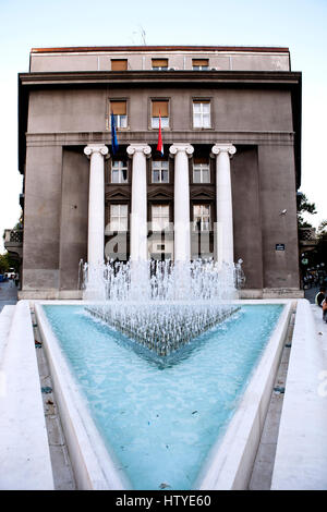 Water fountain in front of the Croatian National Bank building in Zagreb, Croatia. Stock Photo